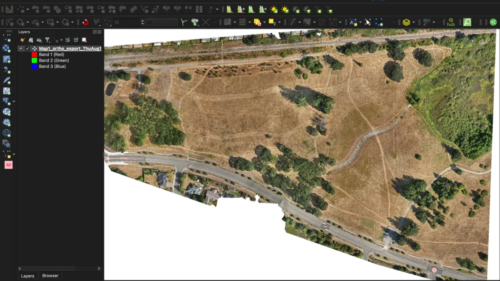 interactive-web-map-02 QGIS interface showing a loaded drone orthomosaic GeoTIFF of McAllister Community Park in the map canvas.